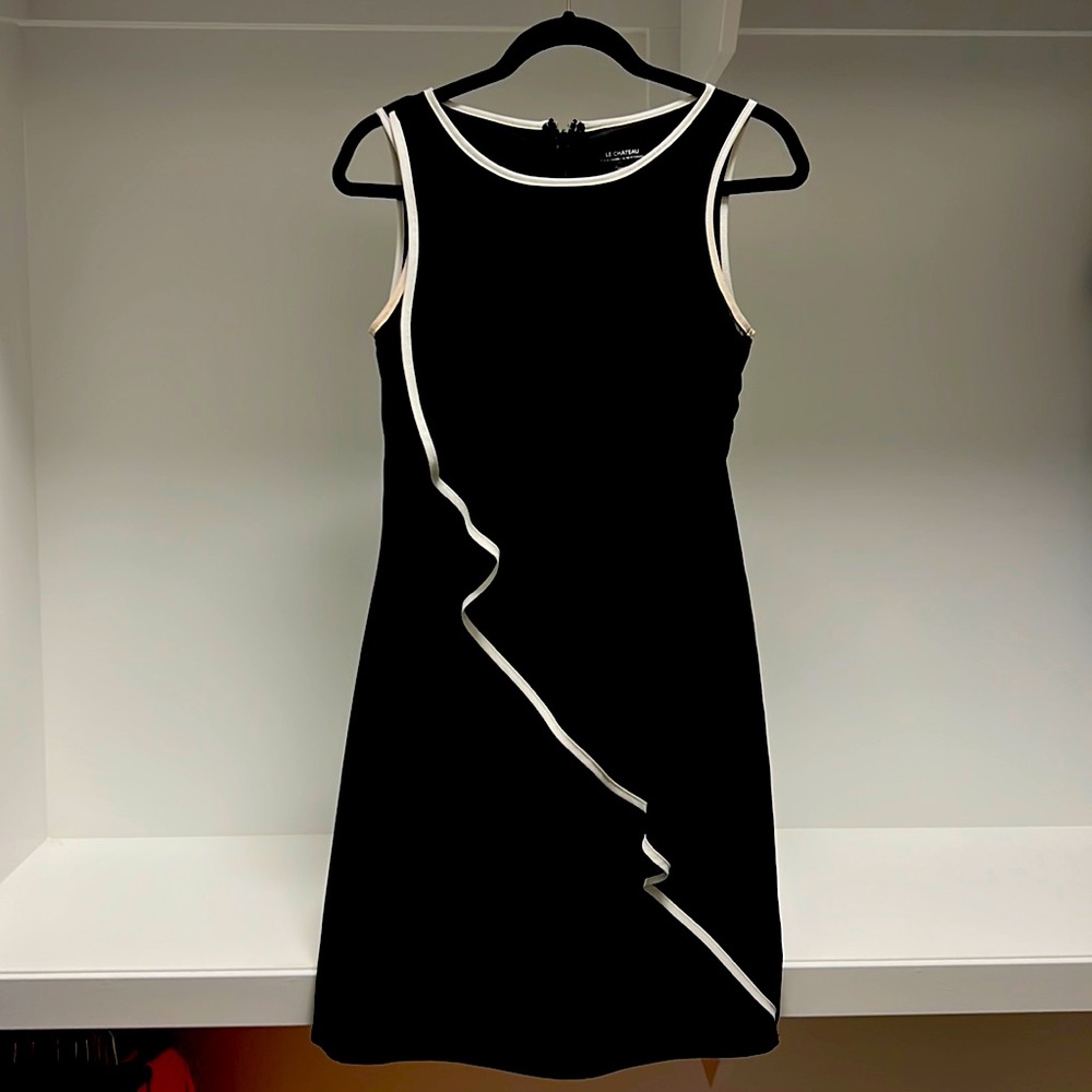 Sheer black dress from Le Château. Excellent condition never worn